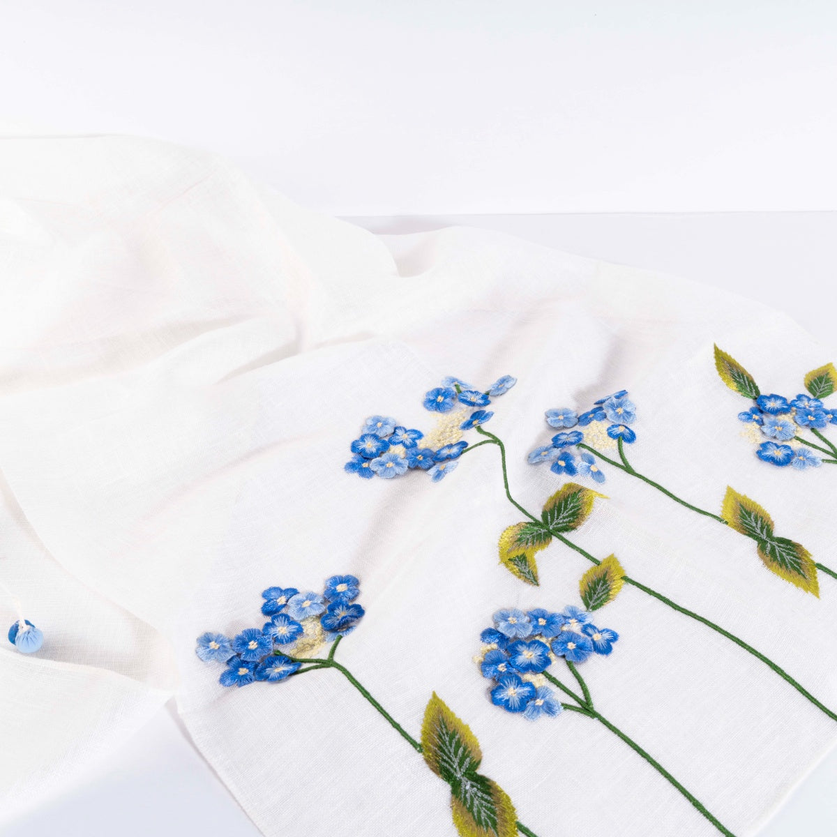 NICE AS ICE - WHITE LINEN STOLE WITH BLUE 3D FLOWERS